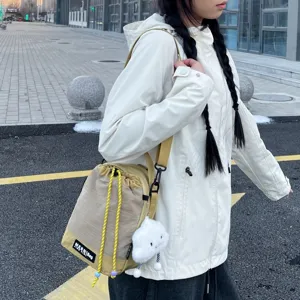 Fashion casual single shoulder messenger bag large capacity bucket bag with cute cloud pendant.
