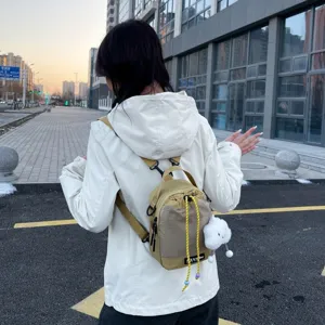 Mini canvas backpack and crossbody bag with cute cloud pendant, casual multi-use daypack.