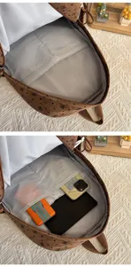 Vista detallada del interior de la mochila de pana marrón que muestra los compartimentos
