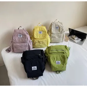 Zaino casual da donna in vari colori, piccola borsa elegante per scuola lavoro e tempo libero.