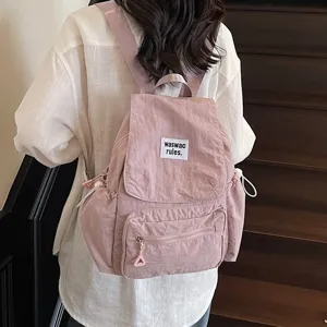 Zaino rosa casual da donna, leggero e pratico zainetto scolastico in nylon con tasca frontale.