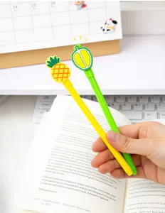 Close-up view of cute cartoon pineapple and durian gel pens for student school supplies