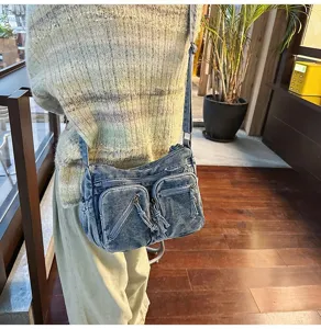 Casual gewassen denim schoudertas voor dames, grote capaciteit, stijlvolle reistas.