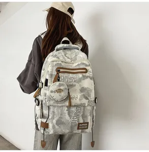Grand sac à dos d'étudiant à imprimé marbre avec bretelles ergonomiques et mini porte-monnaie
