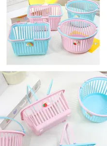 Detailed view of cute colorful mini desktop storage baskets with handles