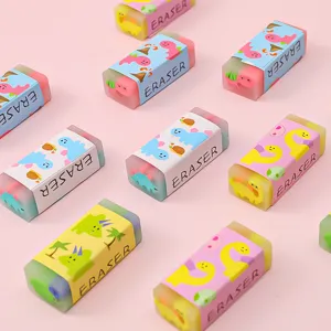 Gommes colorées avec des motifs mignons de dinosaures de dessin animé pour écoliers