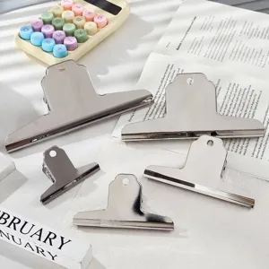 Set of five versatile stainless steel mountain-shaped binder clips for office and home