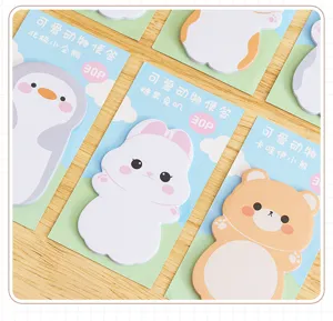 Detailed view of various cute cartoon animal shaped sticky notes on backing cards