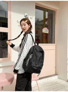 Casual canvas school backpack detail showing stylish straps and large capacity for daily use.