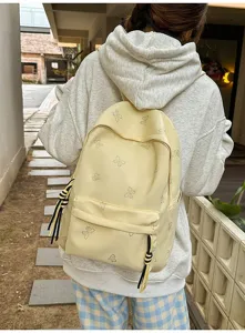 Casual Japanese style large capacity backpack with butterfly rhinestone design, ideal for students.
