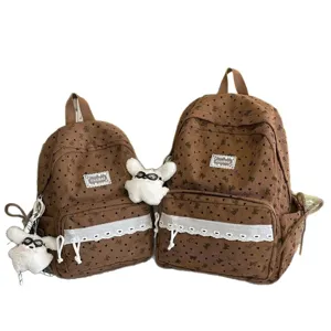 Mochila escolar de pana marrón con estampado de corazones y ribete de encaje para jóvenes