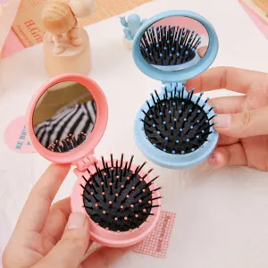Foldable air cushion hairbrush with makeup mirror, compact portable massage comb for daily use.