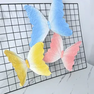 Papillon en papier à pince dégradé dopamine pour décoration de mariage et fête.