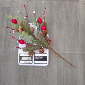 Detailed weight display of a realistic Christmas pine branch with red berries and pine cones.