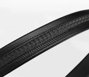 Close-up macro detail showing texture and ratchet track of men's black leather belt
