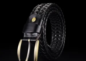 Detailed close-up showing the intricate texture of a black handmade braided leather belt.