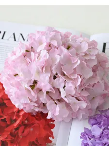 Detailed macro view of soft pink artificial silk hydrangea flower for wedding table decor