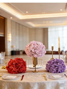 Elegant wedding table centerpieces with red, pink and purple artificial hydrangea flowers