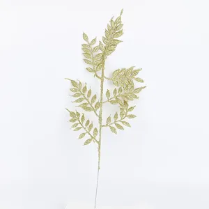 Gold glitter artificial plant leaf detail shot, perfect for Christmas home decor and props.