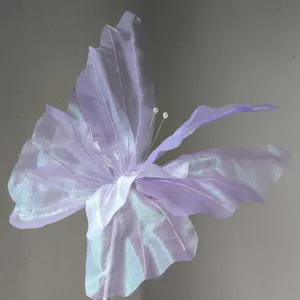 Iridescent lavender fabric butterfly decoration for weddings, detailed texture view