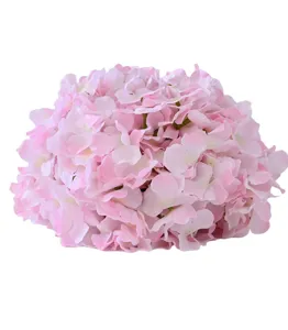 Close-up detail of a soft pink artificial silk hydrangea flower head for wedding decoration