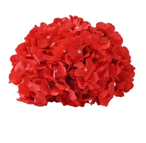 Detailed close-up of vibrant red artificial hydrangea flower head for wedding decoration.