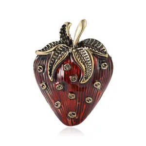 Vintage red enamel strawberry brooch pin with gold-toned alloy for an elegant look.