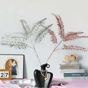 Feuilles persanes à paillettes 5 branches dans un vase pour décor de Noël