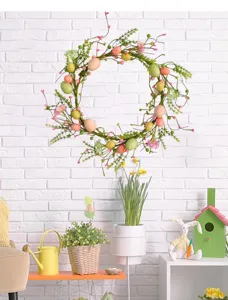 Easter egg wreath with colorful berries on a white brick wall in a festive interior setting