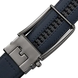 Detailed macro close-up of gunmetal automatic buckle on navy blue leather belt