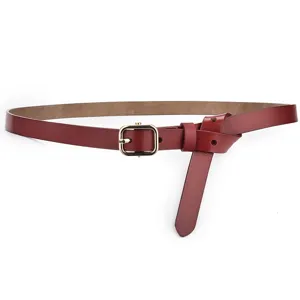 High quality genuine leather women's skinny belt with elegant gold pin buckle in burgundy red