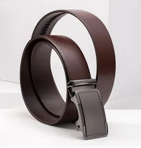 Detail view of a men's brown leather belt with a sleek gunmetal automatic buckle.