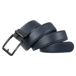 Macro view of navy blue pebbled leather belt featuring a matte black automatic buckle