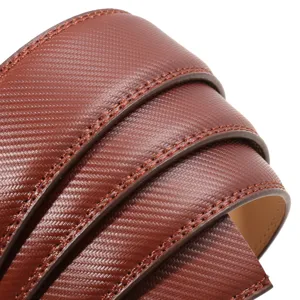 Close-up detail of brown textured leather belt strap showing fine stitching and grain