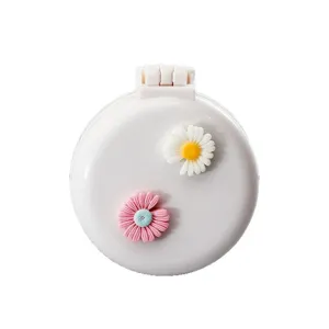 Portable folding air cushion hair brush with cute daisy flowers for daily girl use.