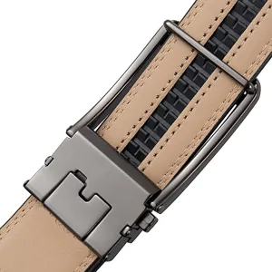 Detailed macro shot of a men's gunmetal automatic ratchet buckle and leather belt strap