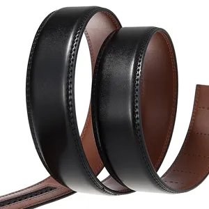 Detailed macro view of black and brown reversible leather belt strap without buckle