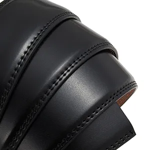 Macro view of high-quality black leather belt strap with detailed double stitching