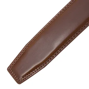 Macro view of a premium brown leather belt strap showing fine stitching detail texture