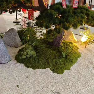 Close-up detail of realistic artificial moss turf used in zen garden landscape design