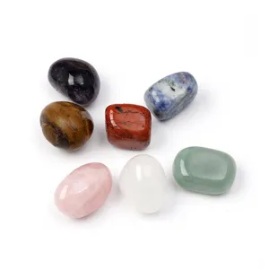 Natural polished tumble stones set including Rose Quartz and Amethyst for healing