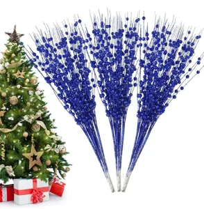 Nahaufnahme blauer Glitzer-Weihnachtsbaum-Sprays mit mehrfach gegabelten Zweigen