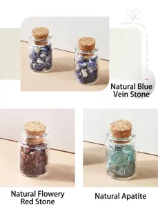Detailed view of natural crystal crushed stones in glass wishing bottles with corks