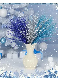 Glitter berry picks in blue and silver colors for festive Christmas vase decor
