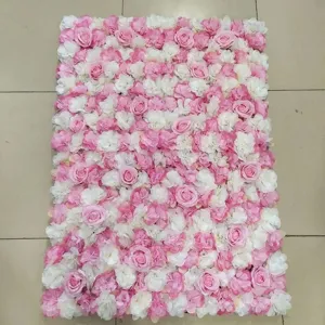 Detailed close-up view of pink and white artificial rose flower wall for wedding decor