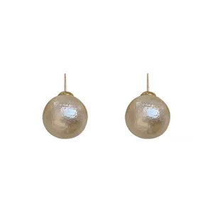 Elegant oversized textured pearl stud earrings featuring a retro French light luxury design