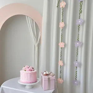 Decorative pastel daisy flower paper garlands for birthday party background scenes