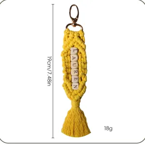 Detailed view of yellow macrame keychain with LAUREN name beads and measurements