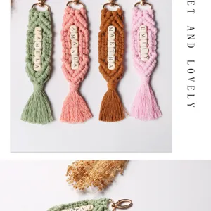 Handmade macrame keychains with personalized letter names in various pastel colors