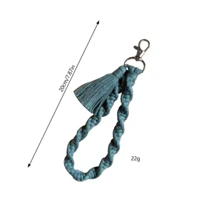 Handmade cotton macrame wristlet keychain with tassel and metal clasp, stylish lanyard.